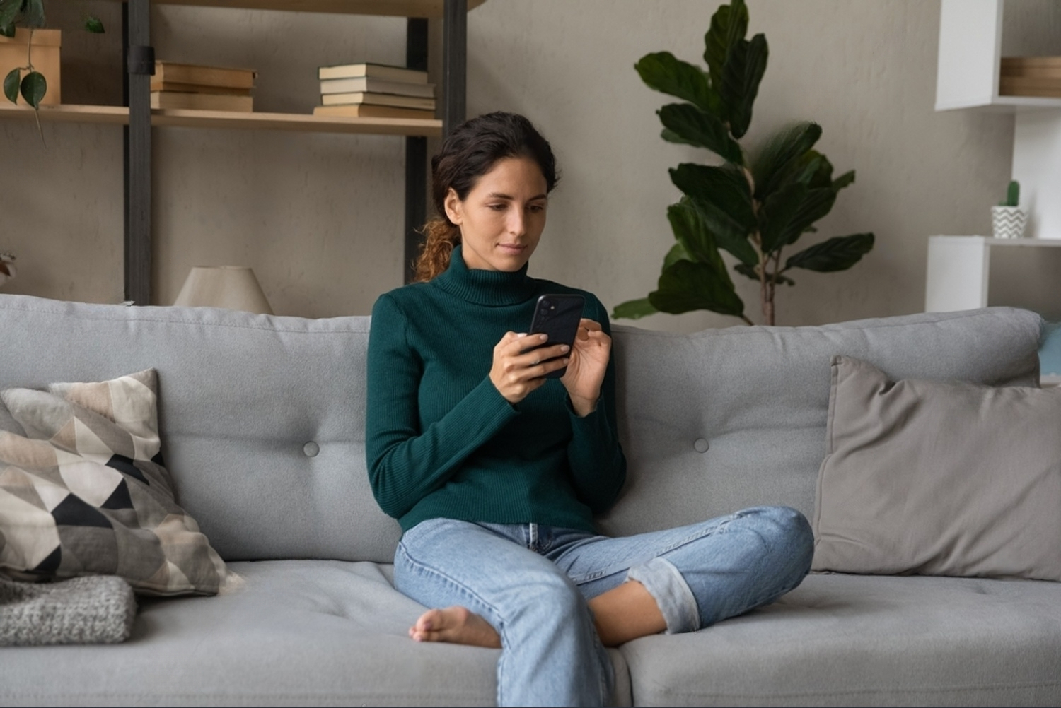 A person working comfortably from home on a phone, their data staying where they are